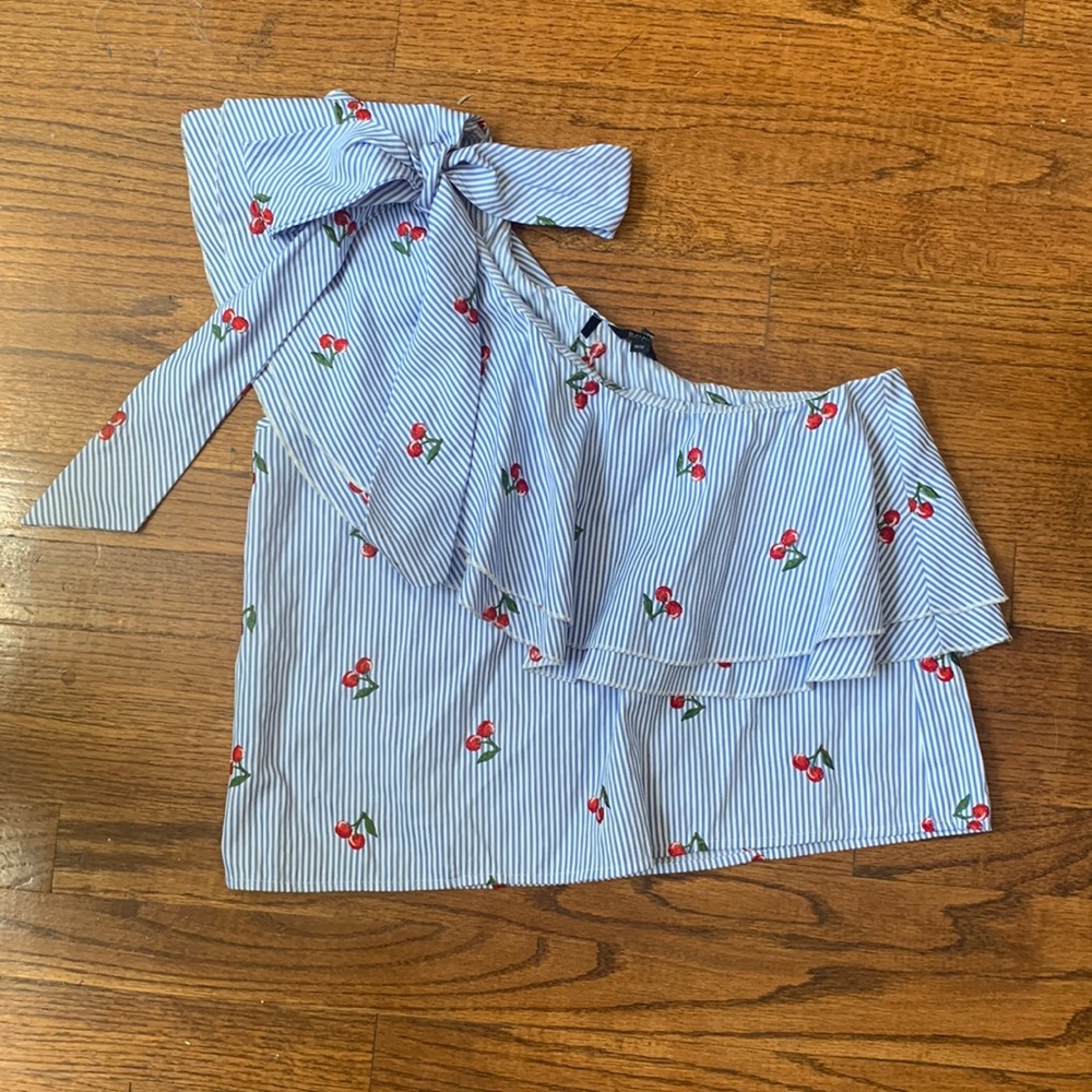 Blue and white striped ruffle one shoulder top with bow. Size medium .